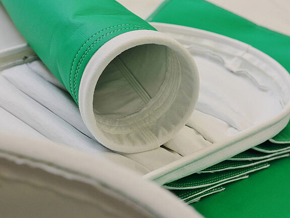Filter bag & filter hose with micro green coating
